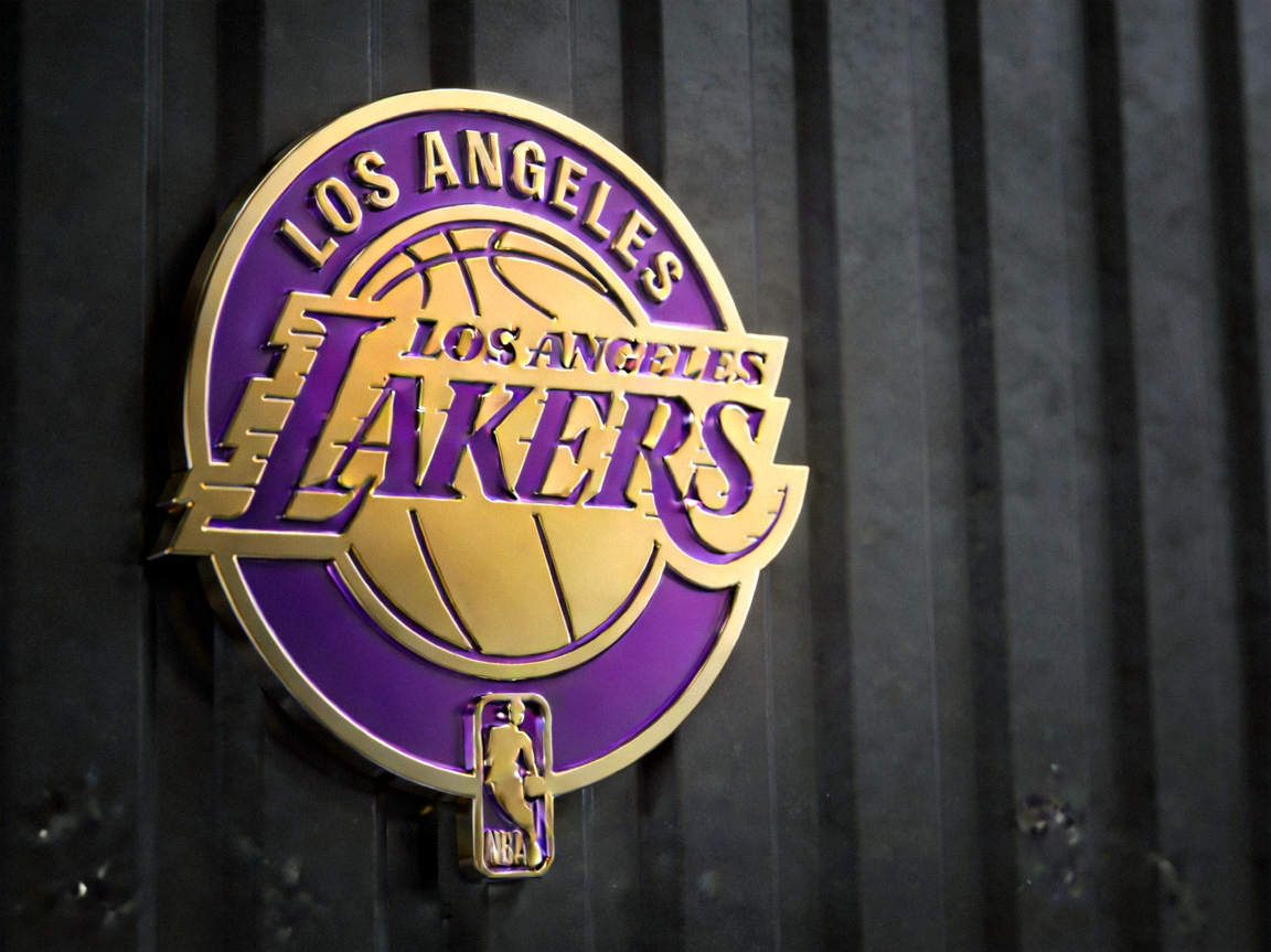 洛杉矶湖人队徽，NBA豪门球队，紫色和金色为主